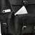 This black leather backpack has pockets behind the pockets.