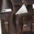 This dark brown leather backpack has pockets behind the pockets.