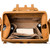 This leather backpack is staying open and showing the light tan interior.