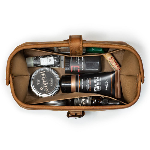 This is a dark brown leather toiletry bag from the top angle full.