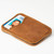 This is a tan brown leather wallet laying down upwards.