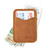 This is a tan brown leather wallet open with cash sticking out both ends.
