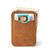 This is a tan brown leather wallet standing with cash.