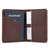 This is the inside of a dark brown leather passport wallet.