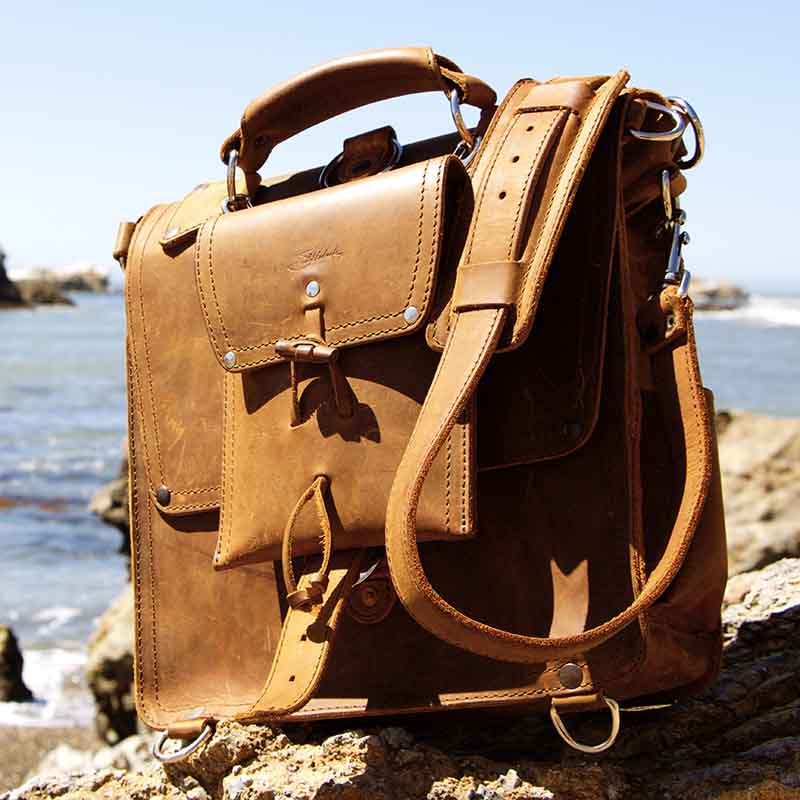 The EDC leather satchel is designed for everyday carry and is unbreakable.