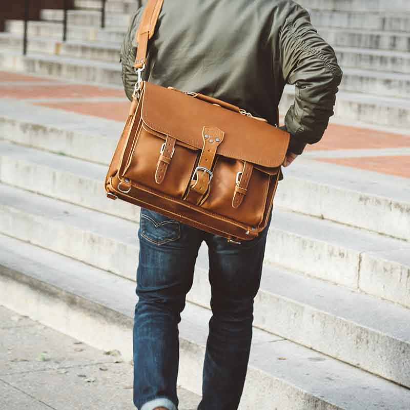 The different colors of this Thin Leather Briefcase are black, chestnut, dark coffee brown, and natural color of tobacco brown. It offers a sleek style and is perfect for a 15" laptop.
