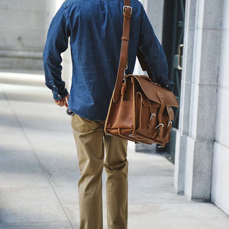 This briefcase has a key strap and a magazine pocket.