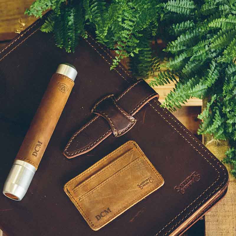 The front pocket wallet is made with tough full grain leather to last for years. It has a minimalist design with room for cards and cash, and the leather is lined with pigskin for added durability. The stitching is also reinforced with marine-grade polyester thread for maximum strength. This wallet is built to last, and its quality is unmatched.