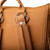 16 inch leather drawstring backpack in tobacco close up