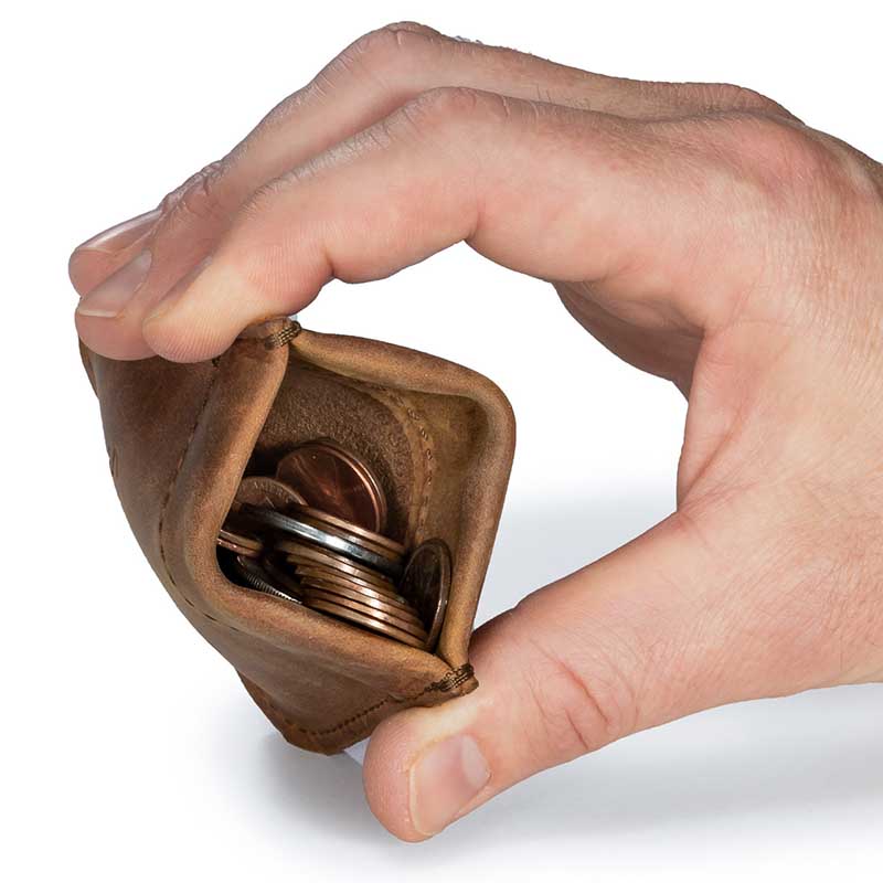 These coin purses are designed to keep their mouth shut until you squeeze them, with custom spring steel pieces that have a memory to remain in the closed position.