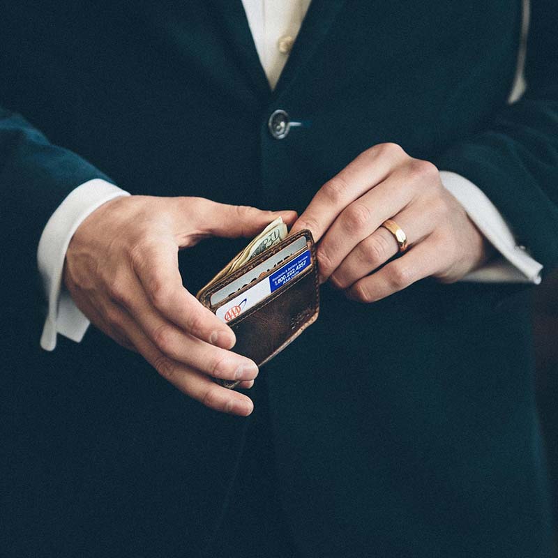 The best front pocket ID wallet for everyday carry is the one that is slim and compact with enough space to store your ID, cards, and cash.
