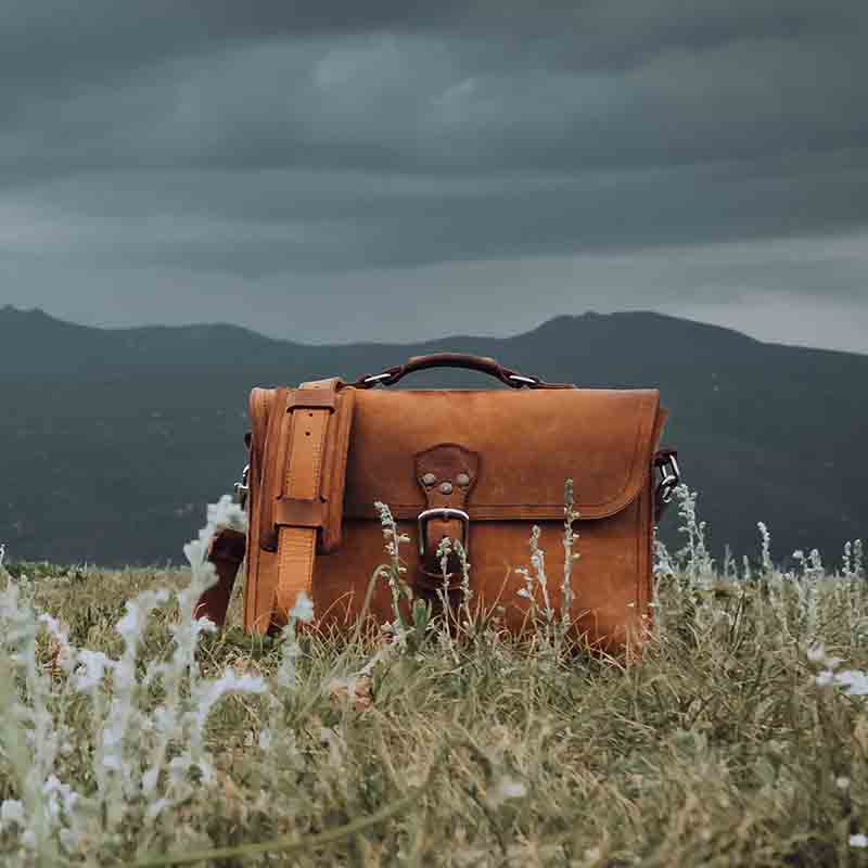 The Thirteener Thin Leather Briefcase is a perfect laptop bag for those on the go, with enough room to store a 13" MacBook Pro and all other essentials.